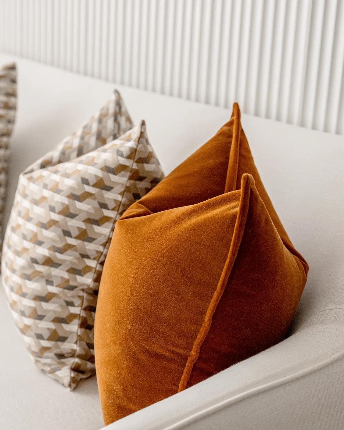 Elda Bundle cushion in rust, shown in a product right view as image 7