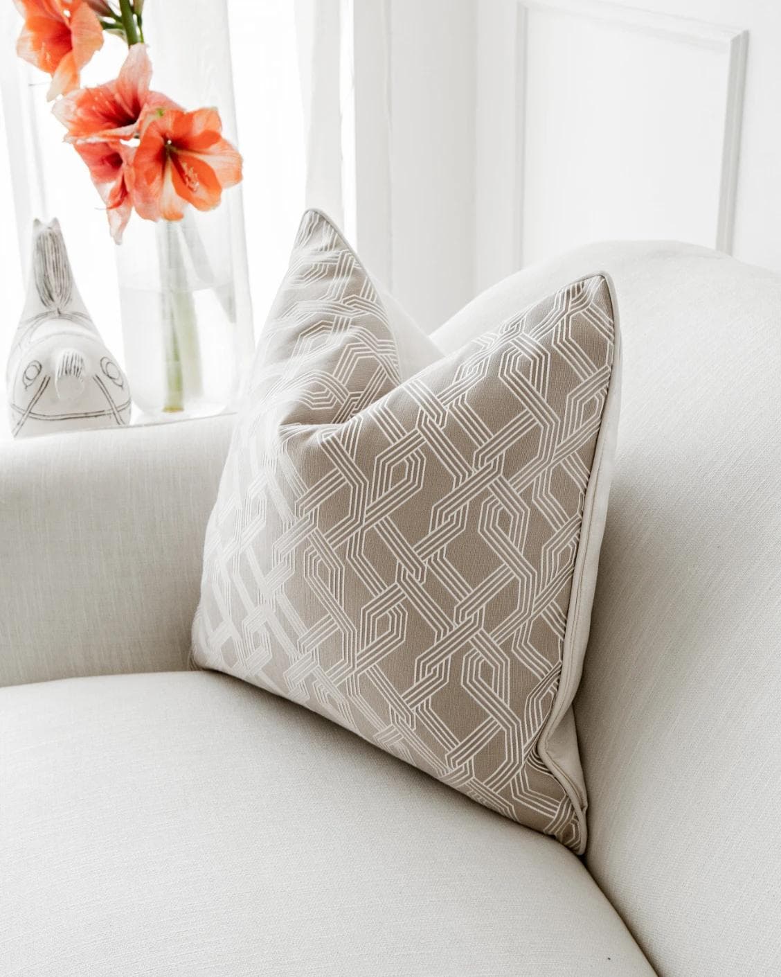 Elena Bianca cushion in beige and white, shown in a lifestyle right view as image 7