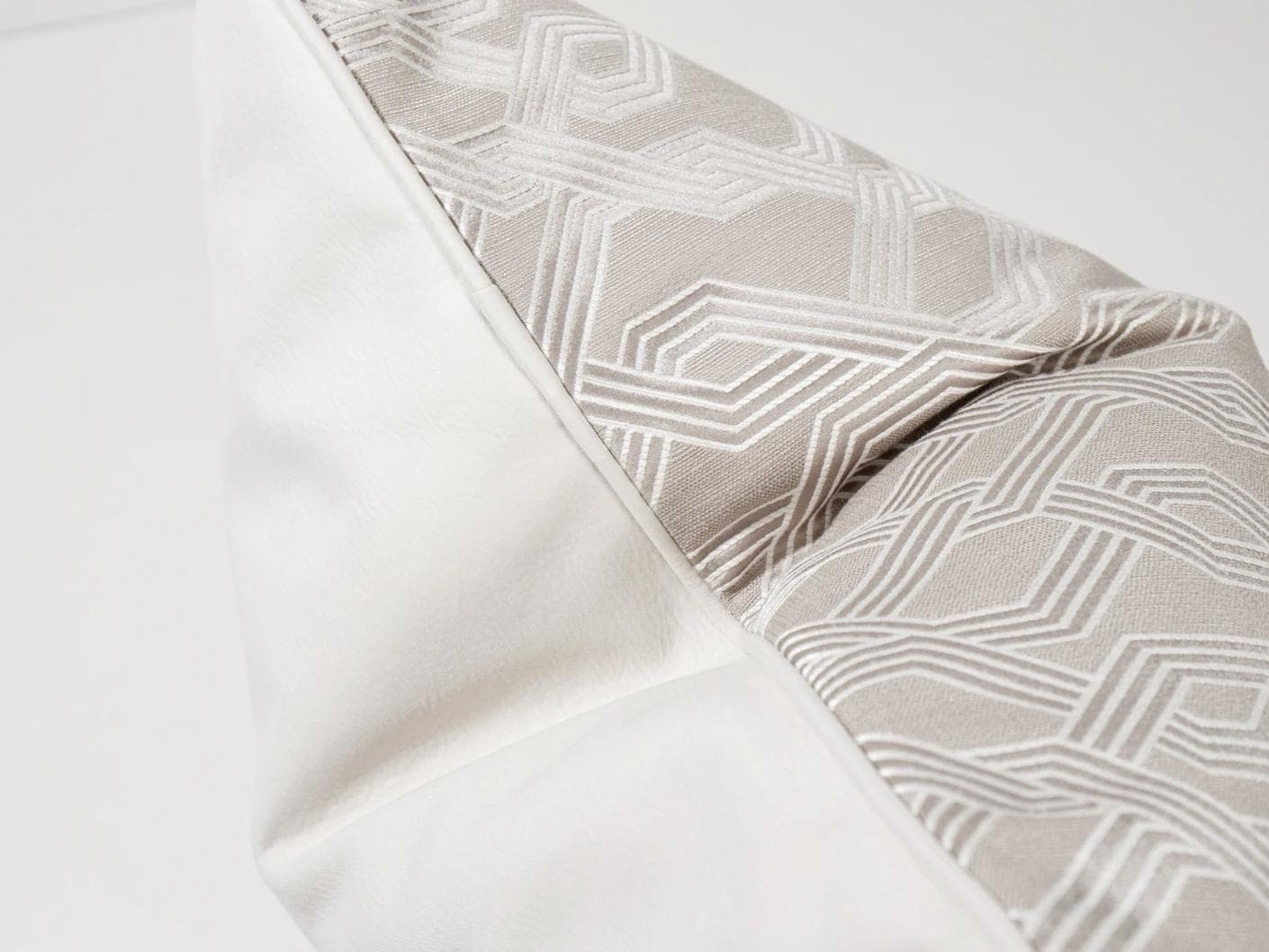 Elena Bianca cushion in beige and white, shown in a product close-up as image 8