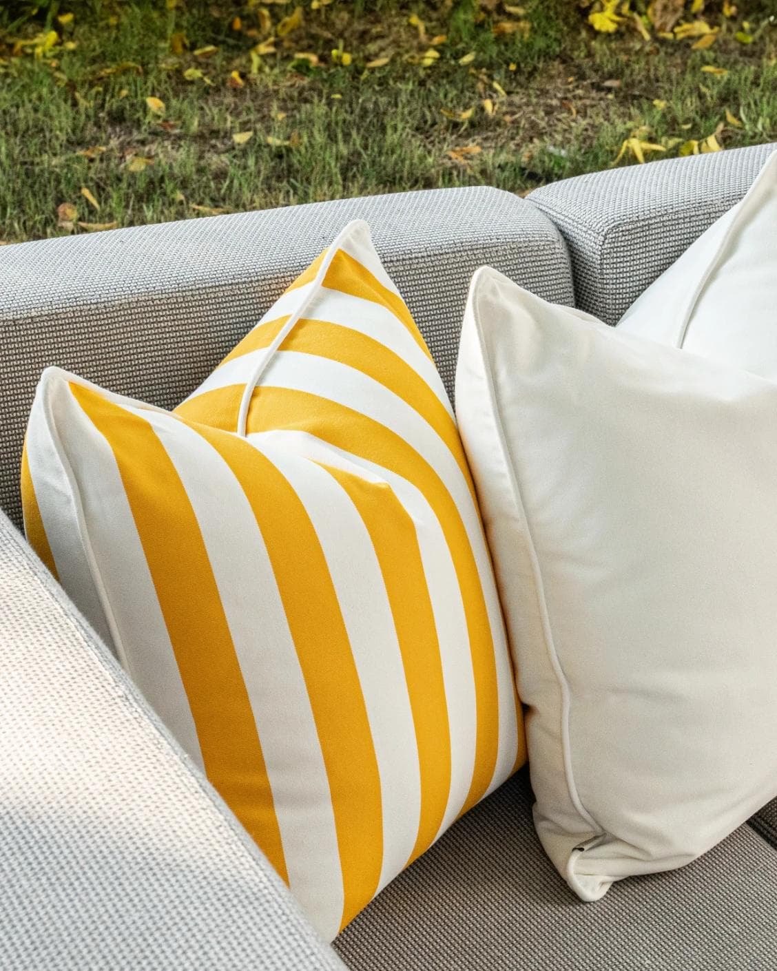 Elio Bundle cushion in turquoise, yellow and ivory, shown in a lifestyle left view as image 5