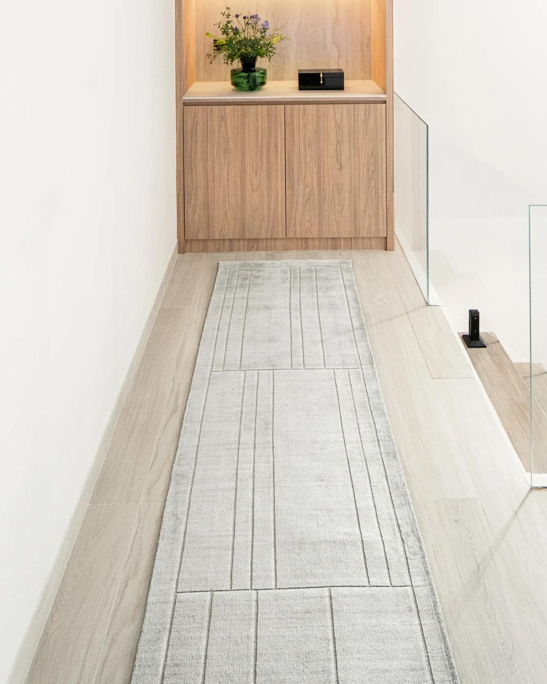 Elliot Ashton Runners carpet in grey and silver, shown in a lifestyle front view