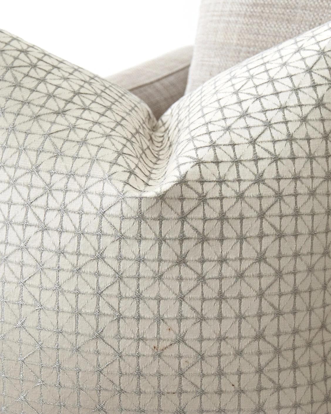 Elmas Klimt cushion in silver and white, shown in a lifestyle close-up as image 4