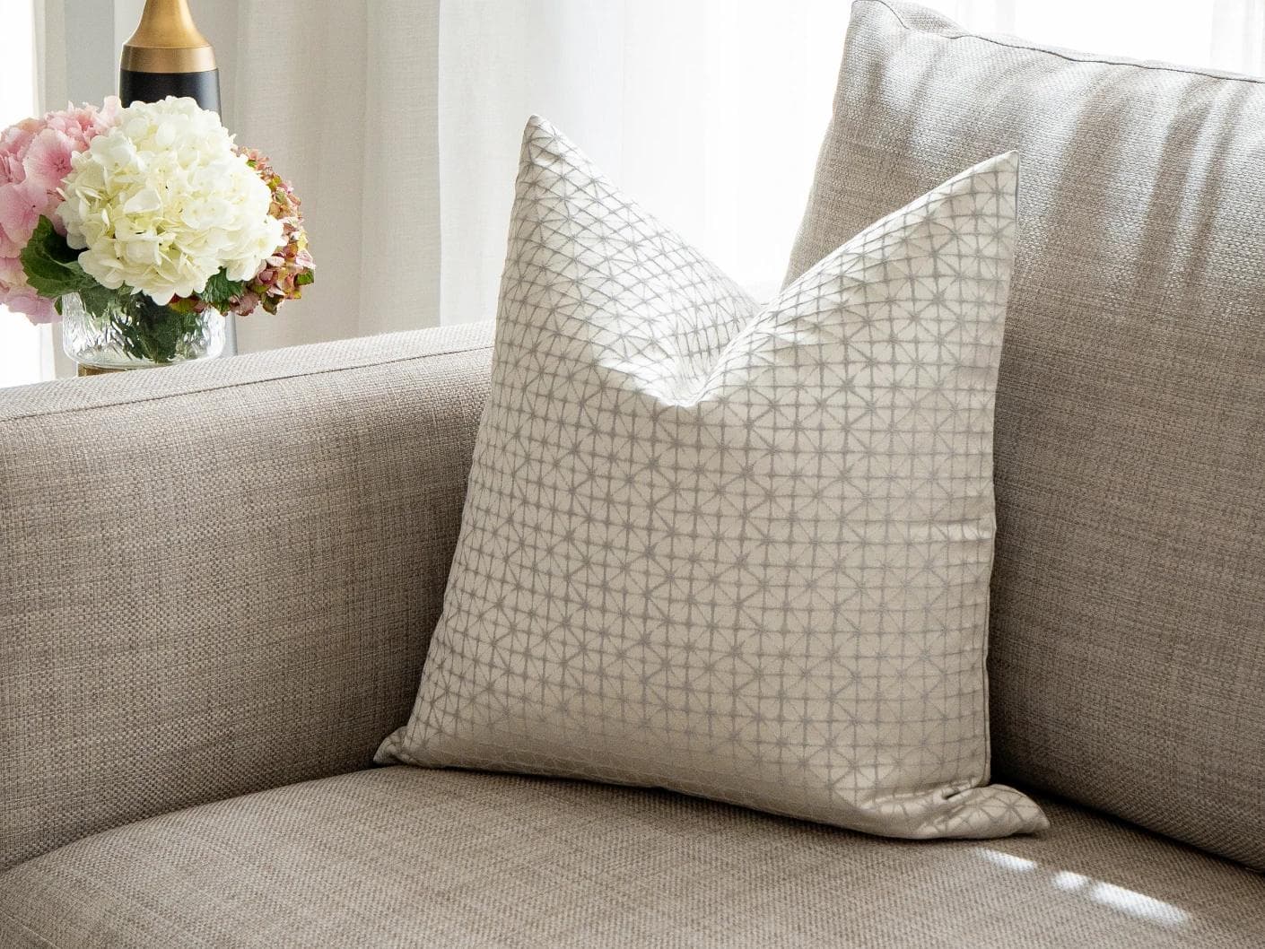 Elmas Klimt cushion in silver and white, shown in a lifestyle front view as image 2