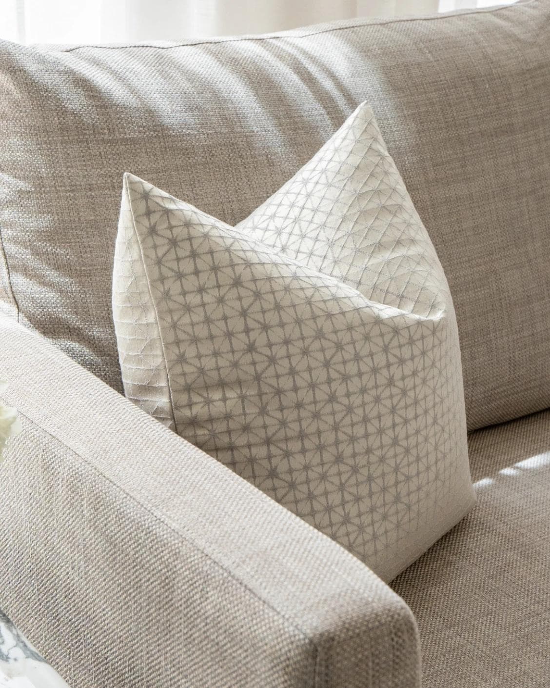 Elmas Klimt cushion in silver and white, shown in a lifestyle left view as image 7