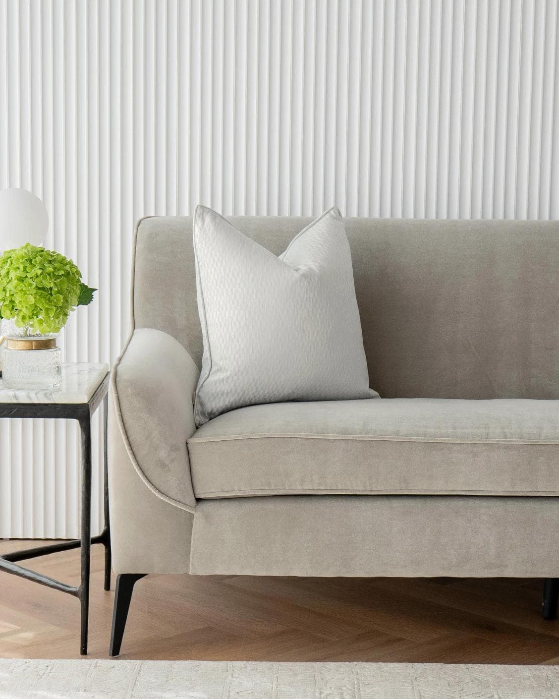 Elodie Bianca cushion in silver, shown in a lifestyle front view as image 4