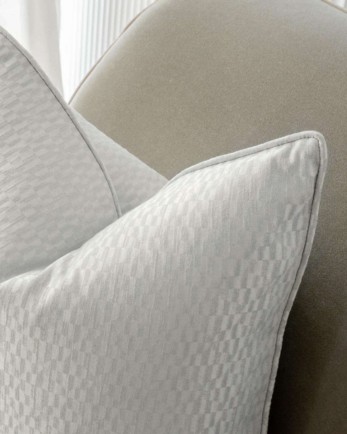 Elodie Bianca cushion in silver, shown in a lifestyle top view as image 5