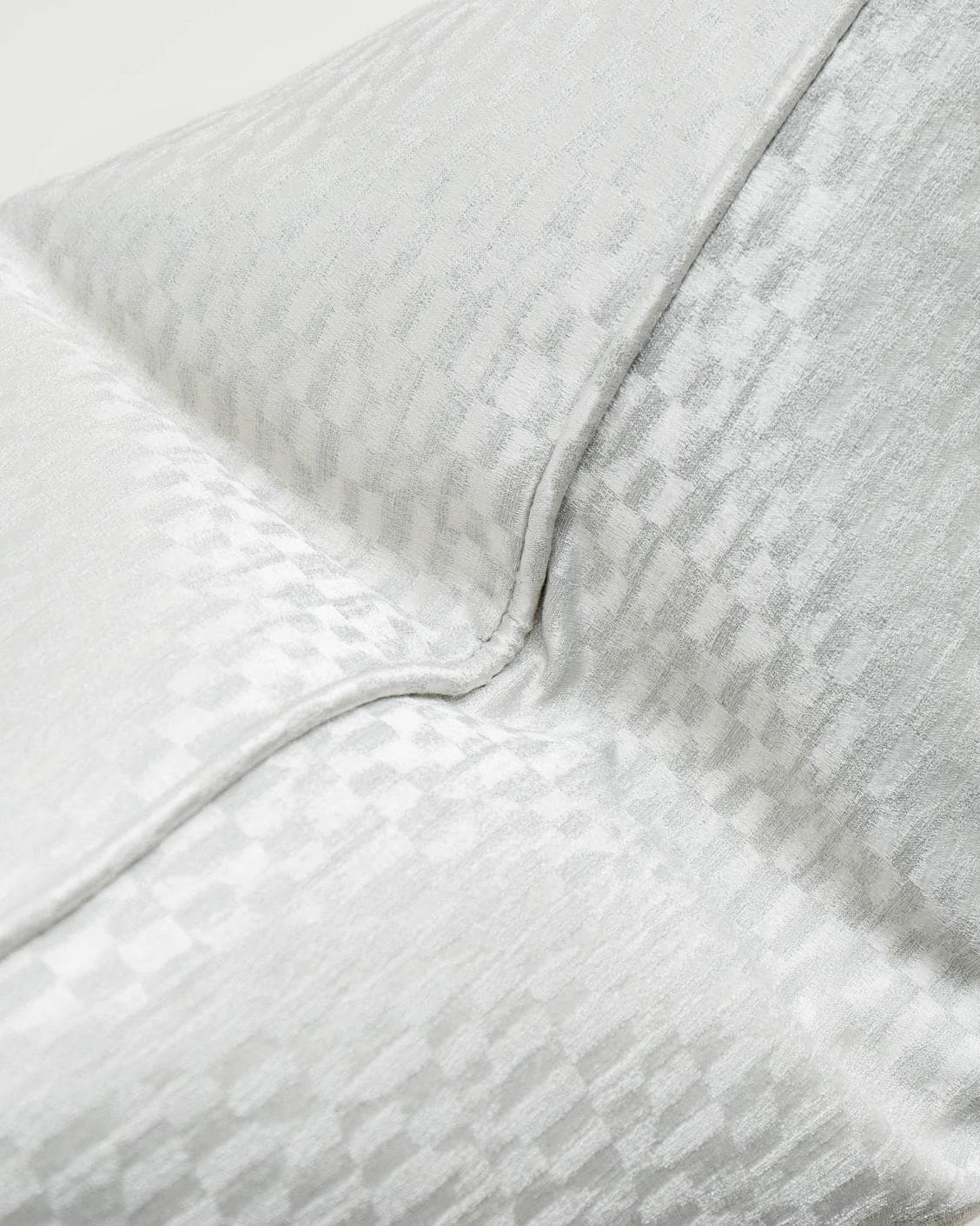 Elodie Bianca cushion in silver, shown in a product close-up as image 6