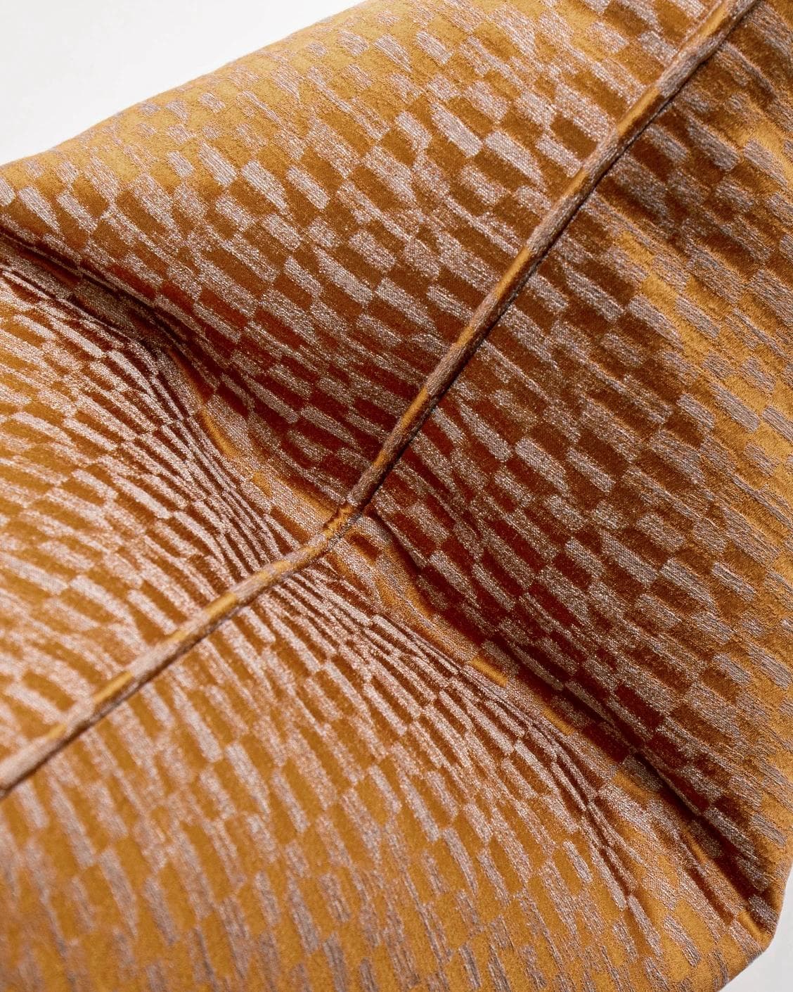 Elodie Hodler cushion in silver and orange, shown in a product close-up as image 6
