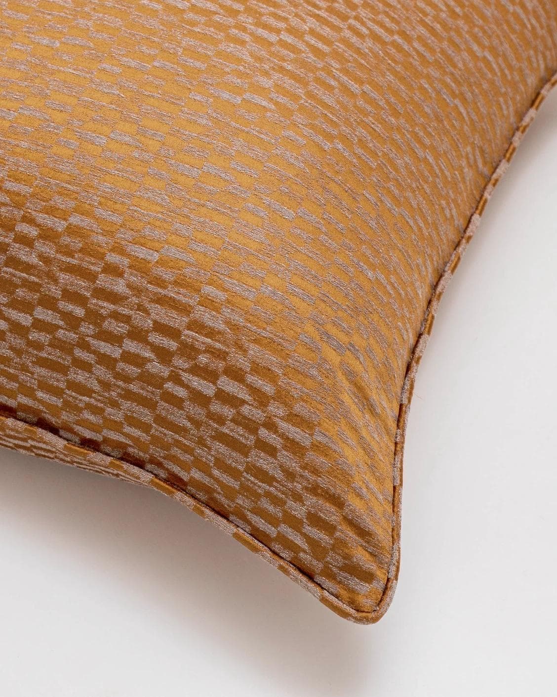 Elodie Hodler cushion in silver and orange, shown in a product top view as image 7