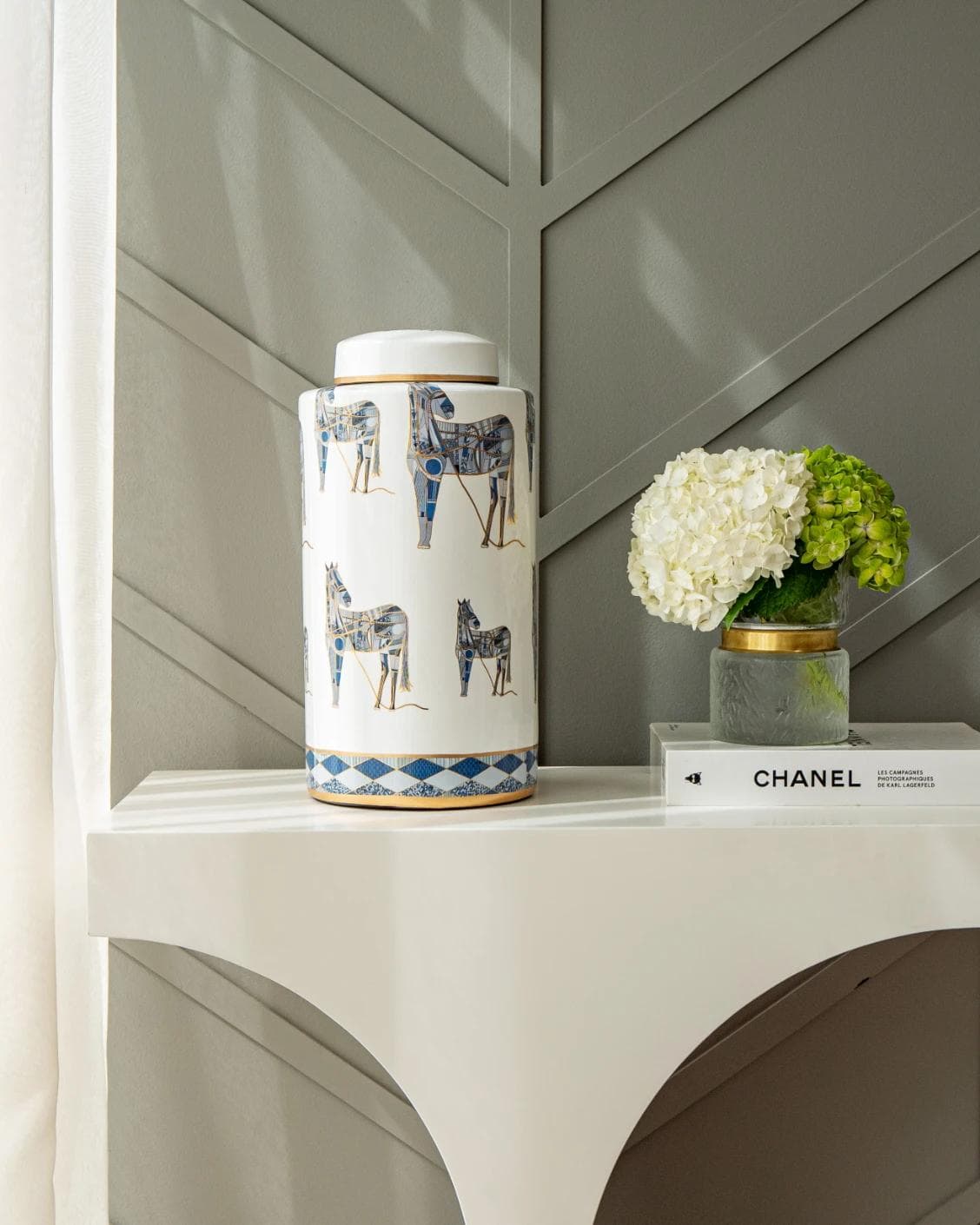 Eloisa Arneson jars in white and blue, shown in a lifestyle front view as image 4