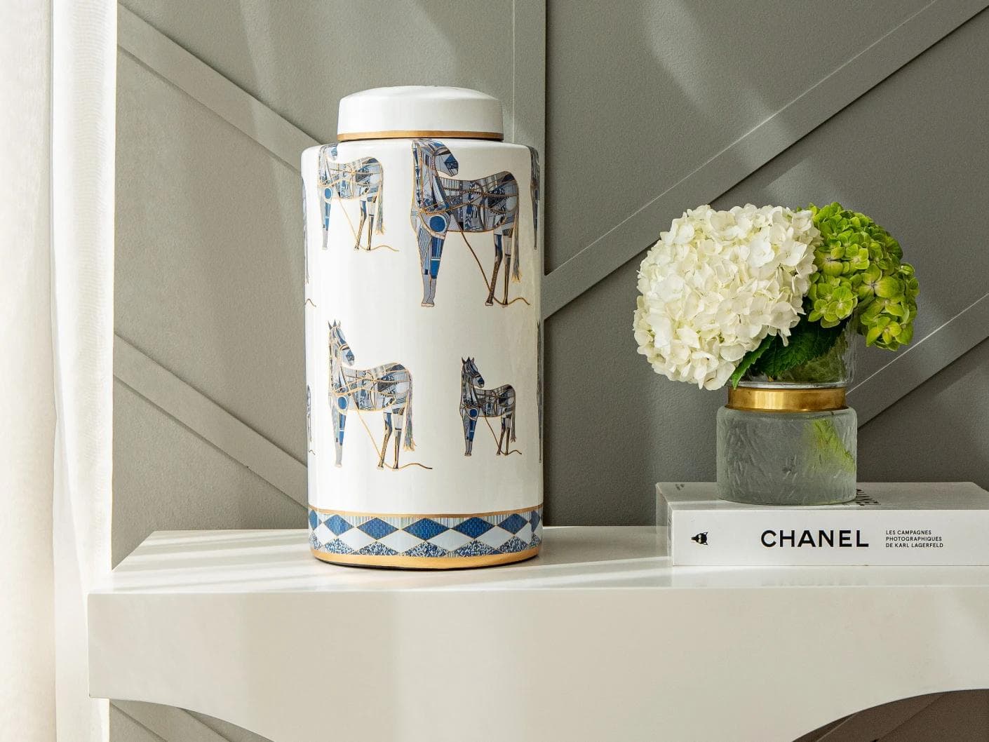 Eloisa Arneson jars in white and blue, shown in a lifestyle front view as image 4
