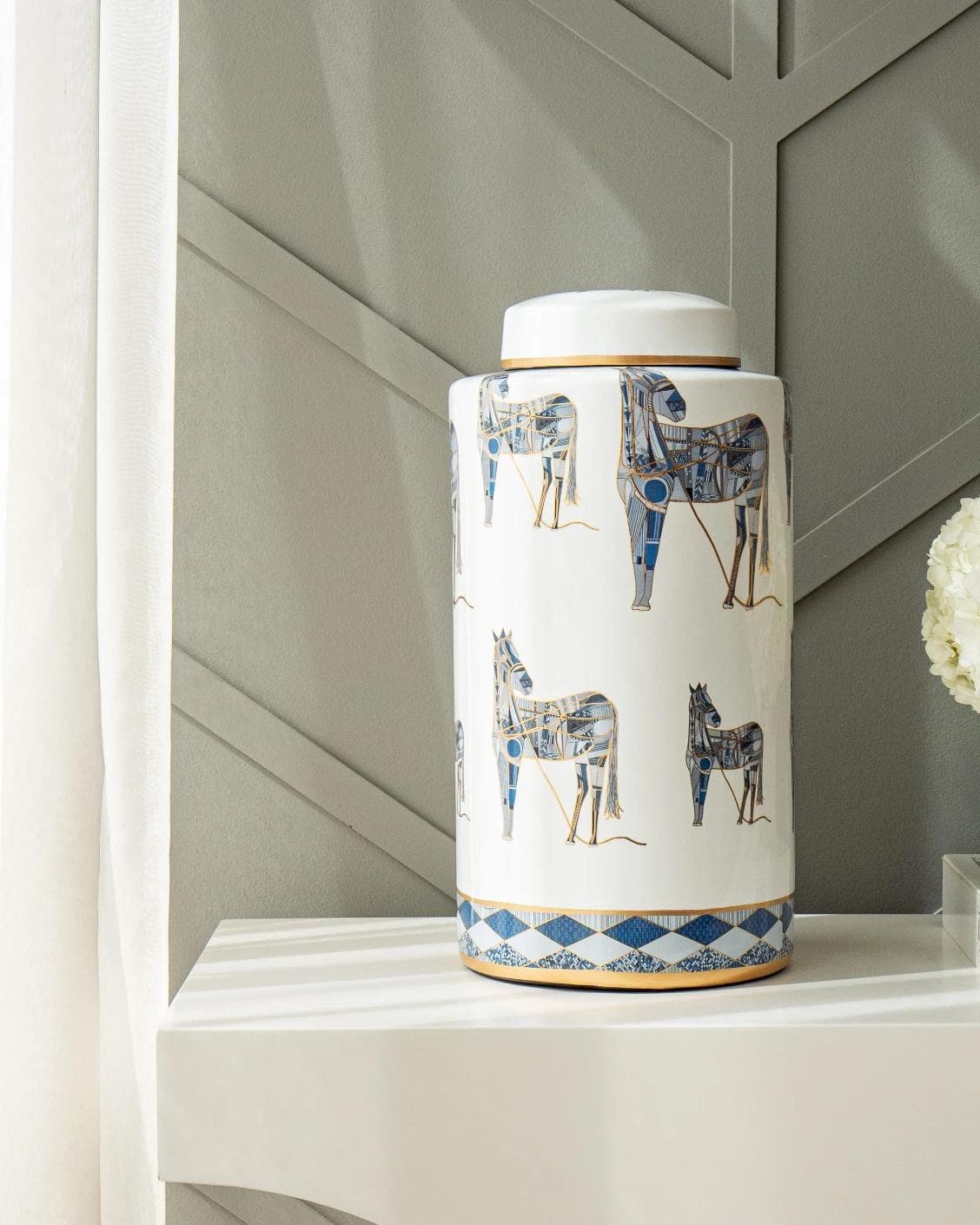 Eloisa Arneson jars in white and blue, shown in a lifestyle front view as image 5