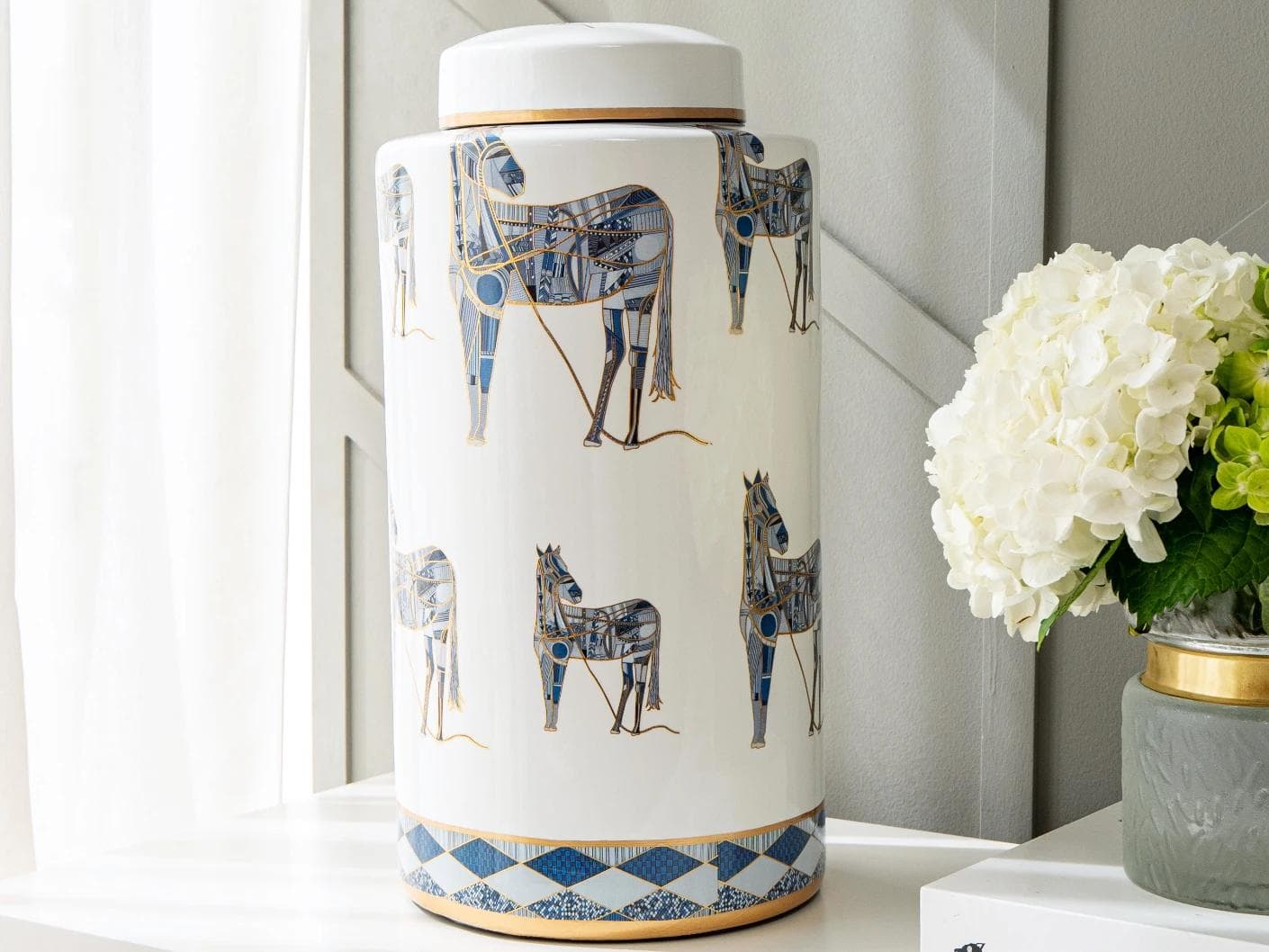 Eloisa Arneson jars in white and blue, shown in a lifestyle right view as image 2