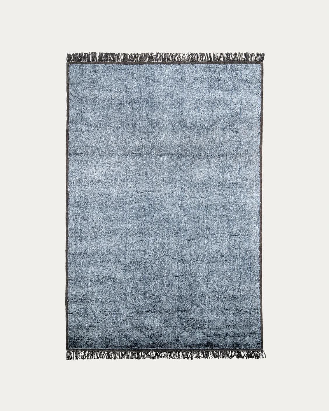 Elyse Sky carpets in blue, shown in a product top view as image 1