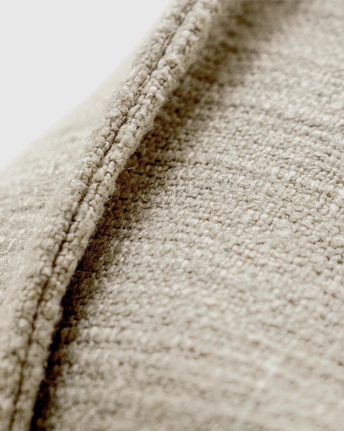 Emmett Alba cushion in beige, shown in a product close-up as image 8