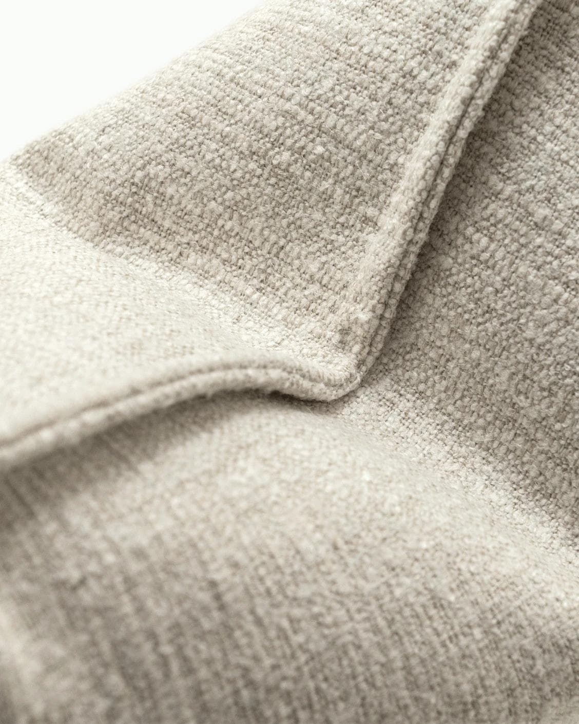Emmett Bianca cushion in off white, shown in a product close-up as image 7
