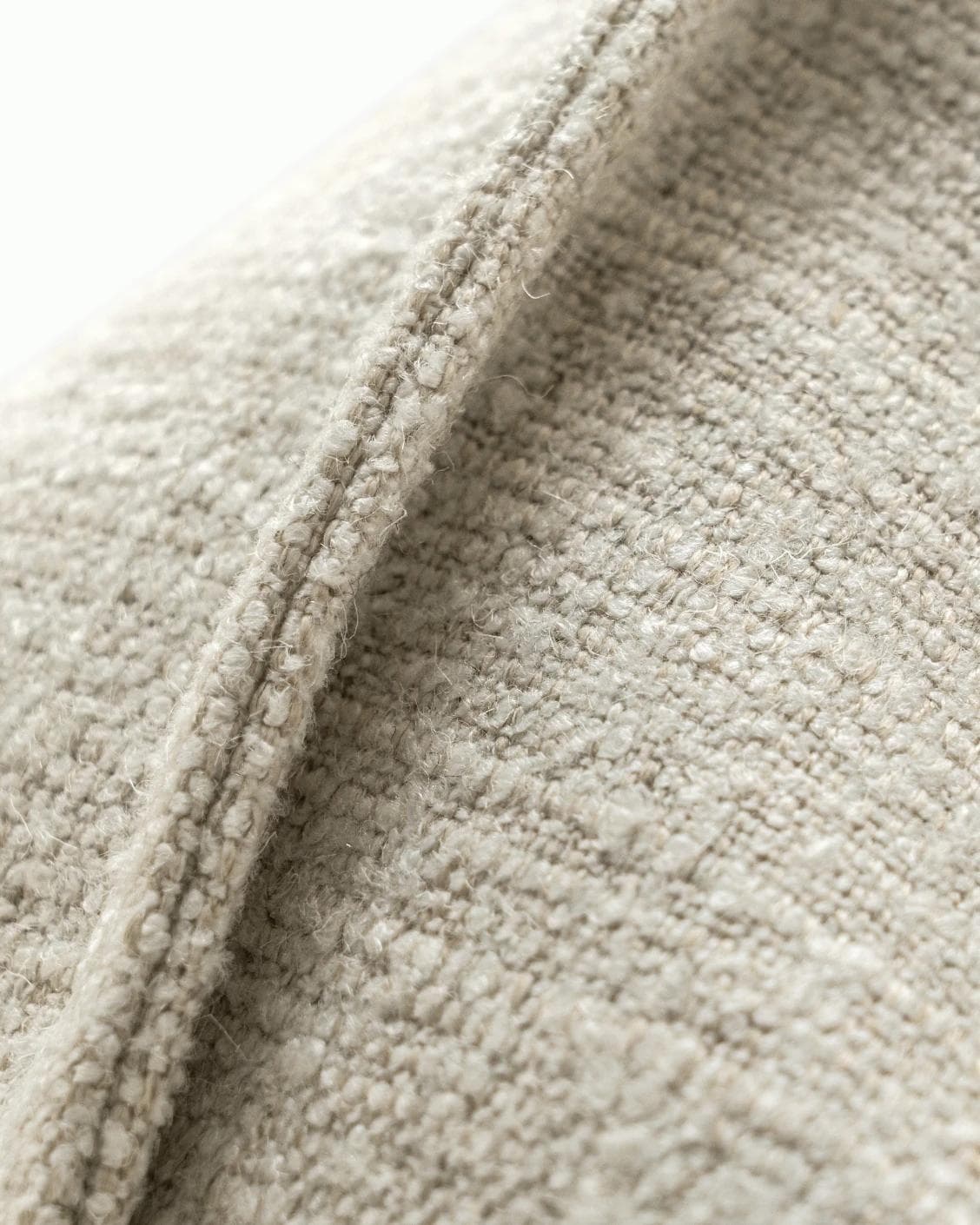 Emmett Bianca cushion in off white, shown in a product close-up as image 8