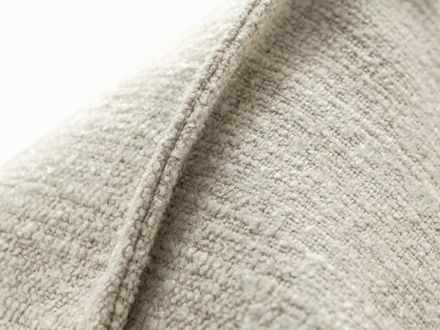 Emmett Bianca cushion in off white, shown in a product close-up as image 8