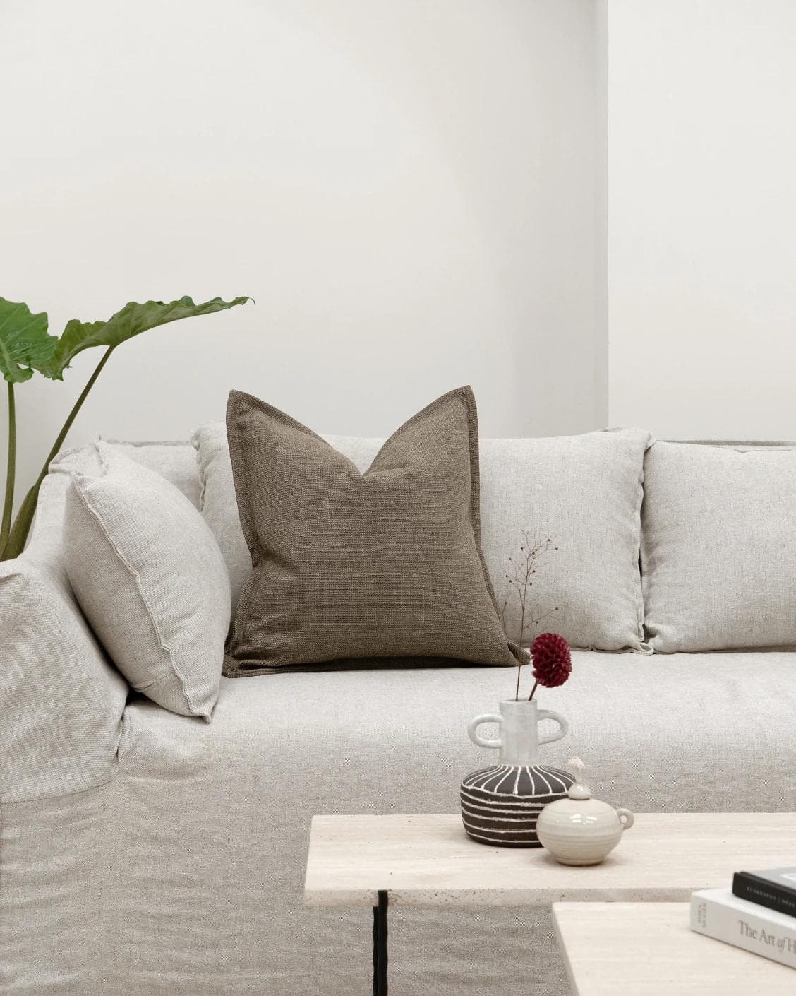 Emmett Braun cushion in brown, shown in a lifestyle front view as image 4