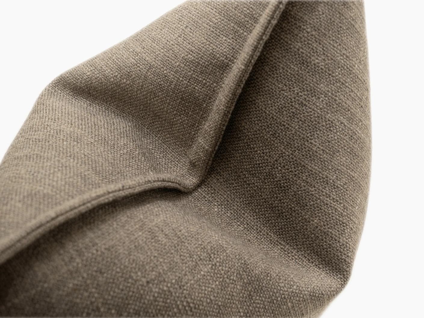 Emmett Braun cushion in brown, shown in a product close-up as image 7