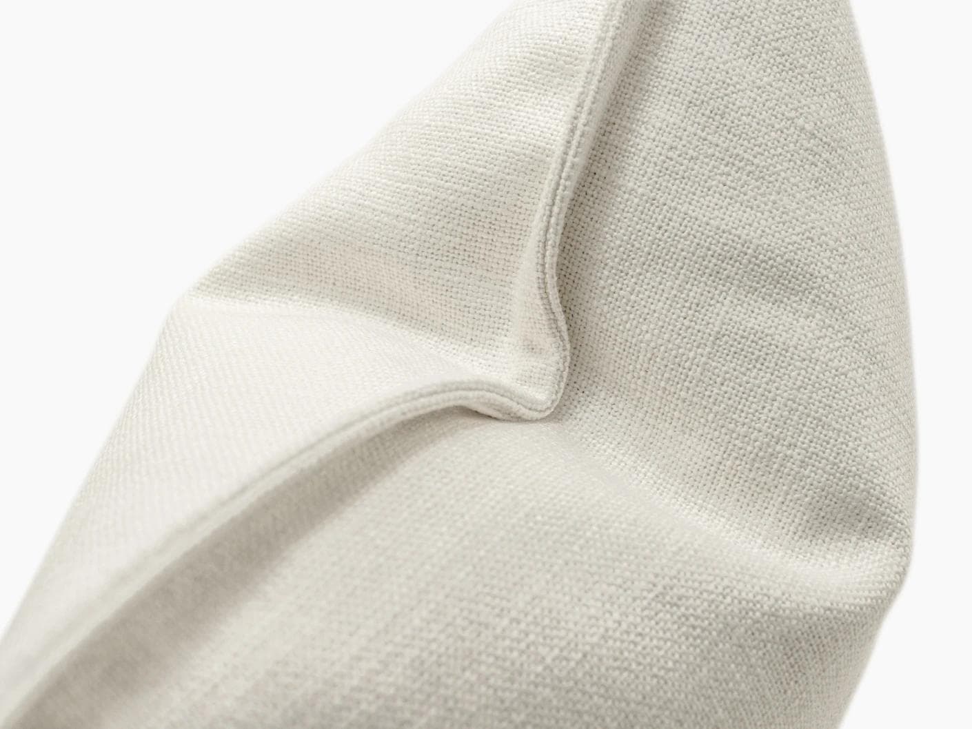 Emmett Jasmine cushion in white, shown in a product close-up as image 7