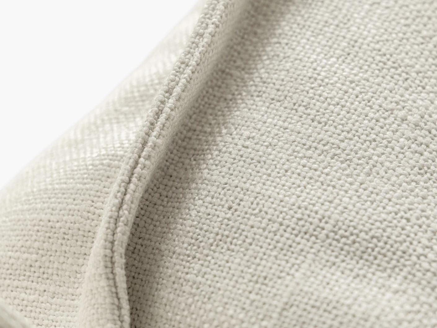 Emmett Jasmine cushion in white, shown in a product close-up as image 8
