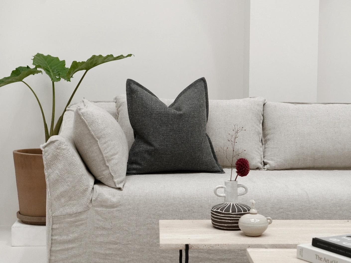 Emmett Nyx cushion in grey, shown in a lifestyle front view as image 4