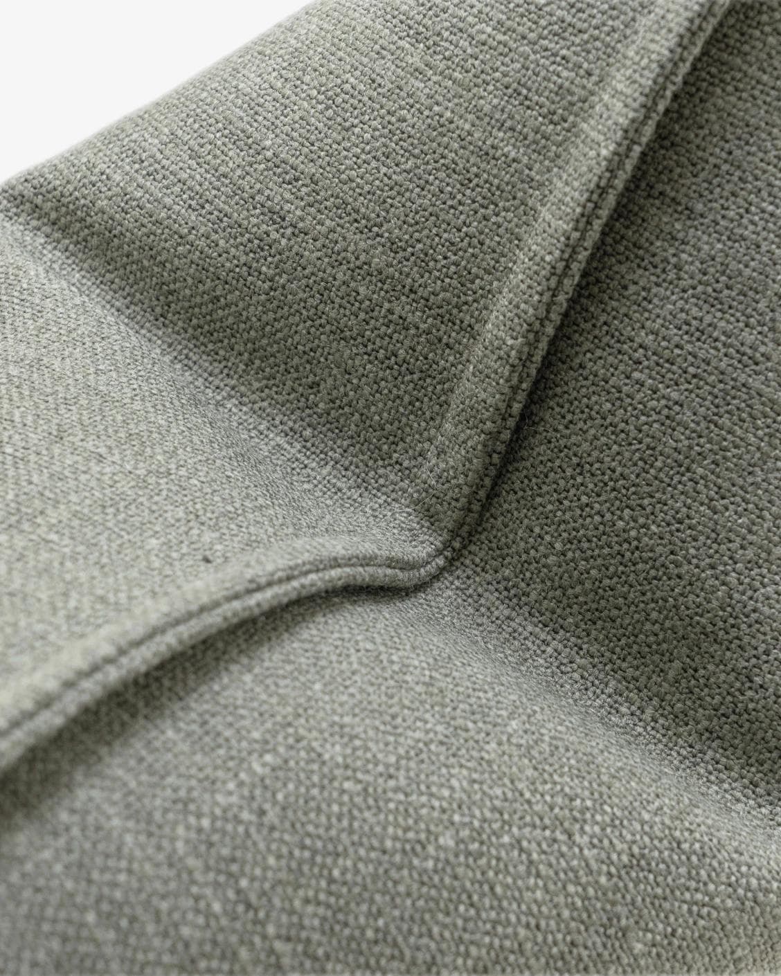 Emmett Olive cushion in green, shown in a product close-up as image 6