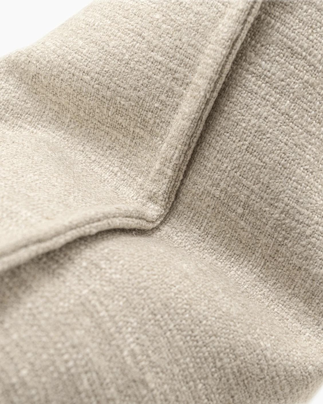 Emmett Shale cushion in beige, shown in a product close-up as image 1