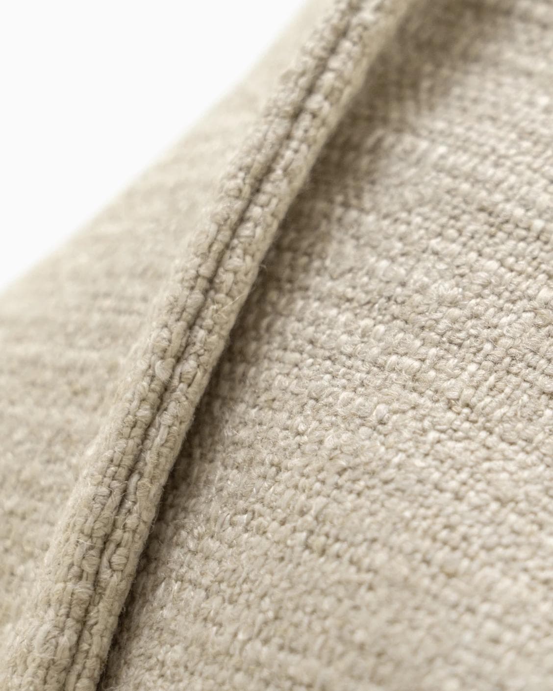 Emmett Shale cushion in beige, shown in a product close-up as image 8