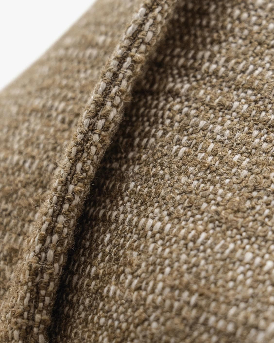 Emmett Tawna cushion in brown, shown in a product close-up as image 8