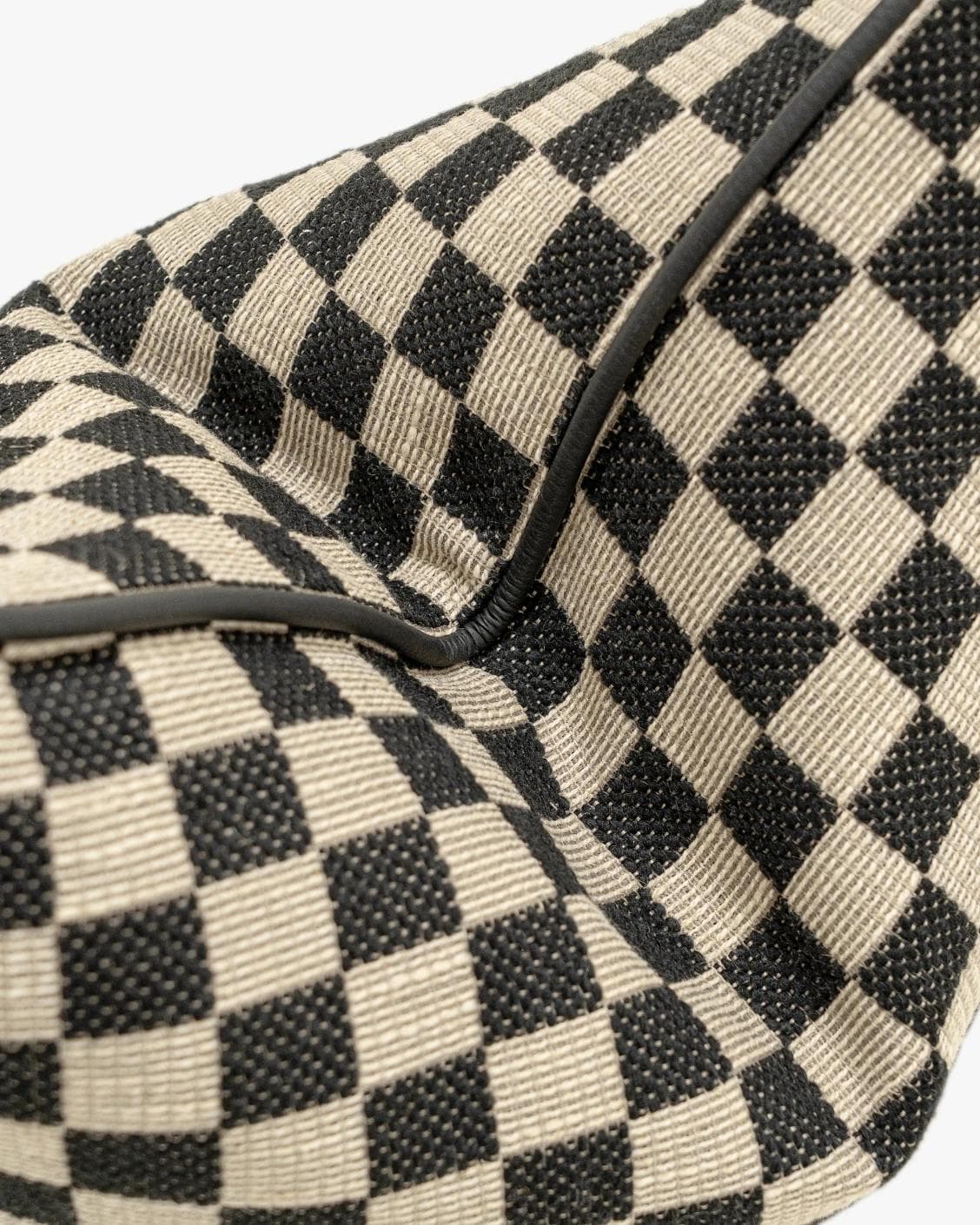 Enya Steele cushion in black and beige, shown in a product close-up as image 1