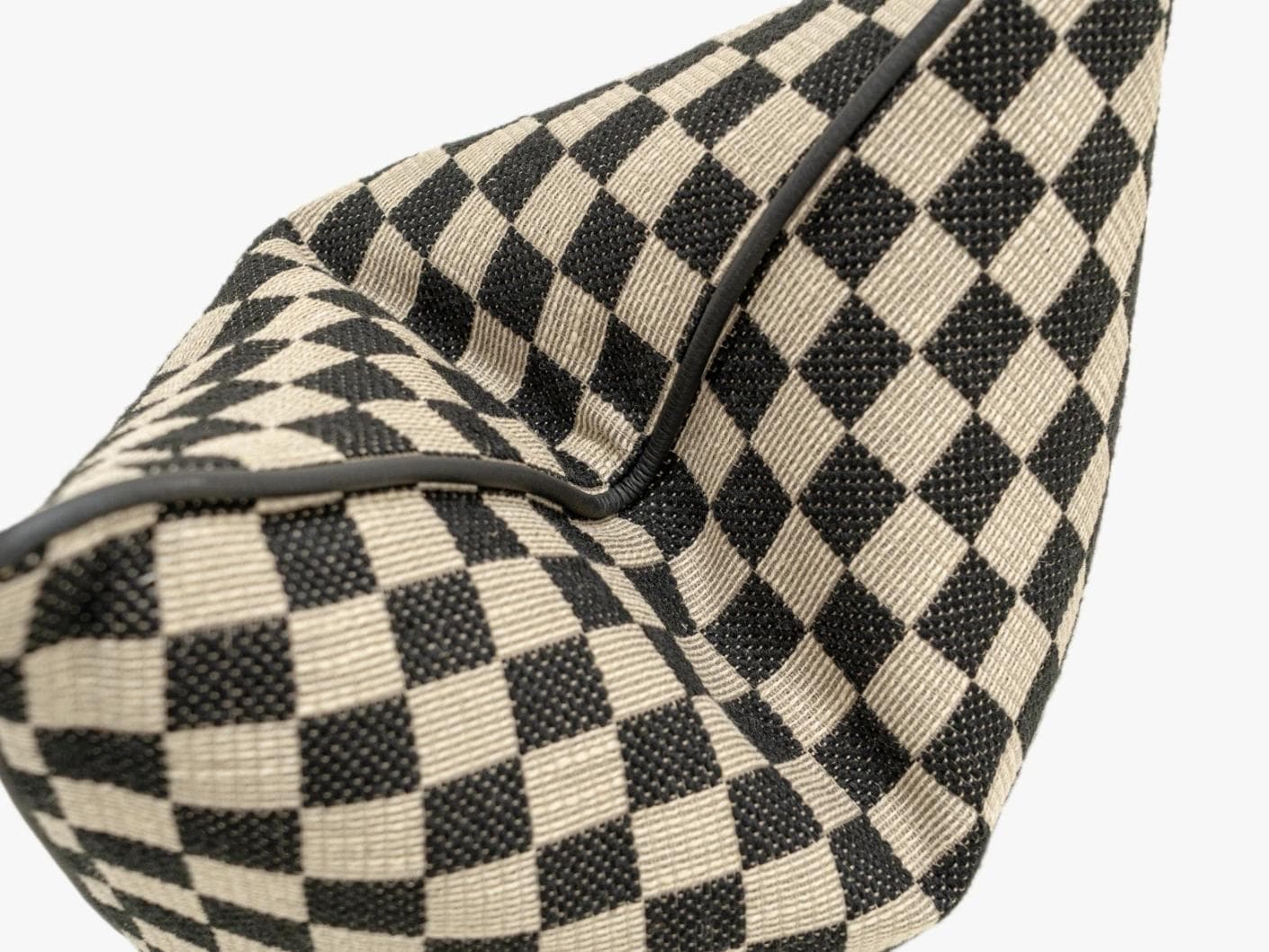 Enya Steele cushion in black and beige, shown in a product close-up as image 1
