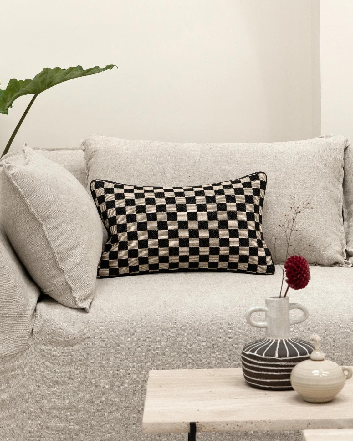 Enya Steele II cushion in black and beige, shown in a product front view as image 8