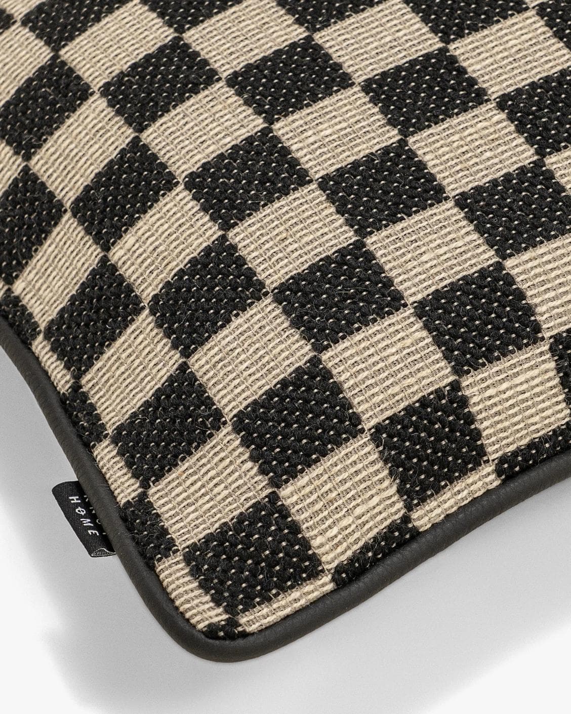 Enya Steele II cushion in black and beige, shown in a product top view as image 10