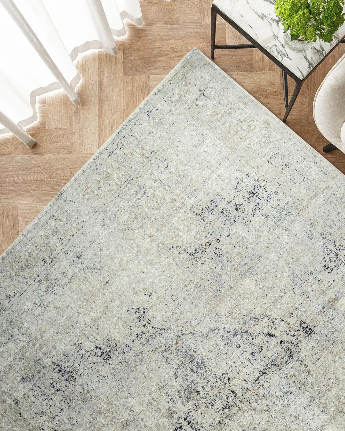 Ethan Dune carpet in grey and beige, shown in a lifestyle top view as image 2
