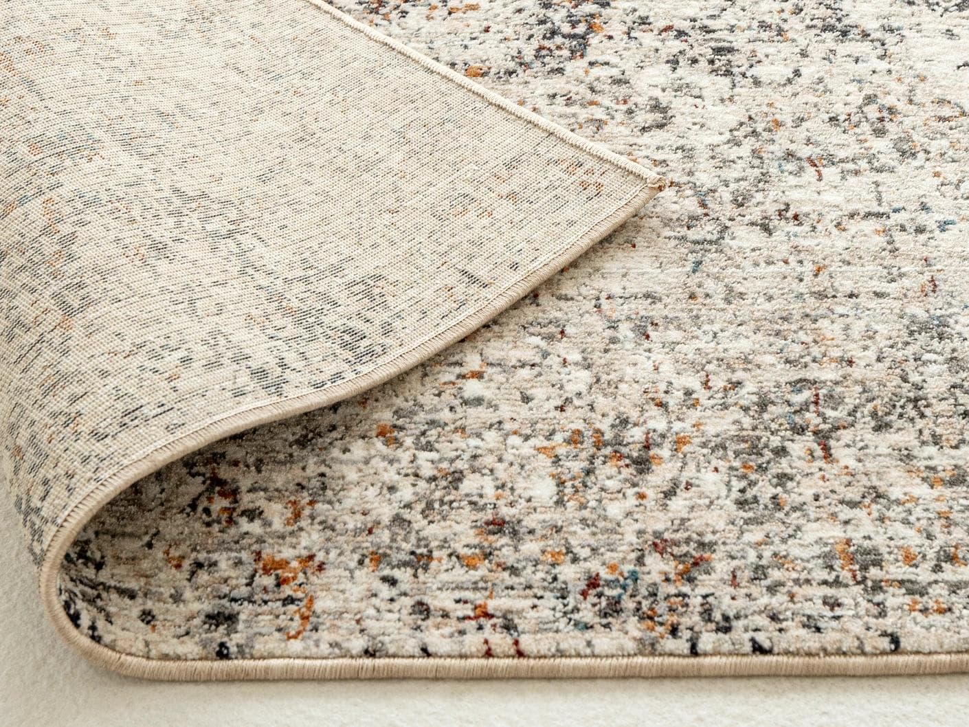 Ethan Dune II carpets in grey, beige and multicolour, shown in a lifestyle close-up as image 2