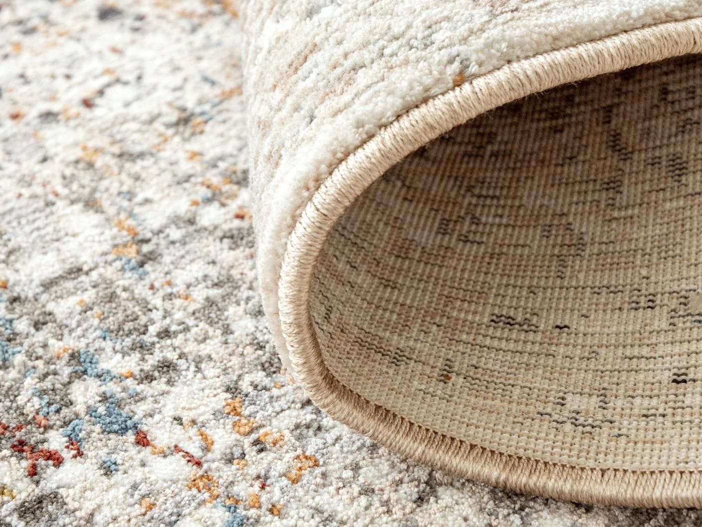 Ethan Dune II carpets in grey, beige and multicolour, shown in a product close-up as image 1