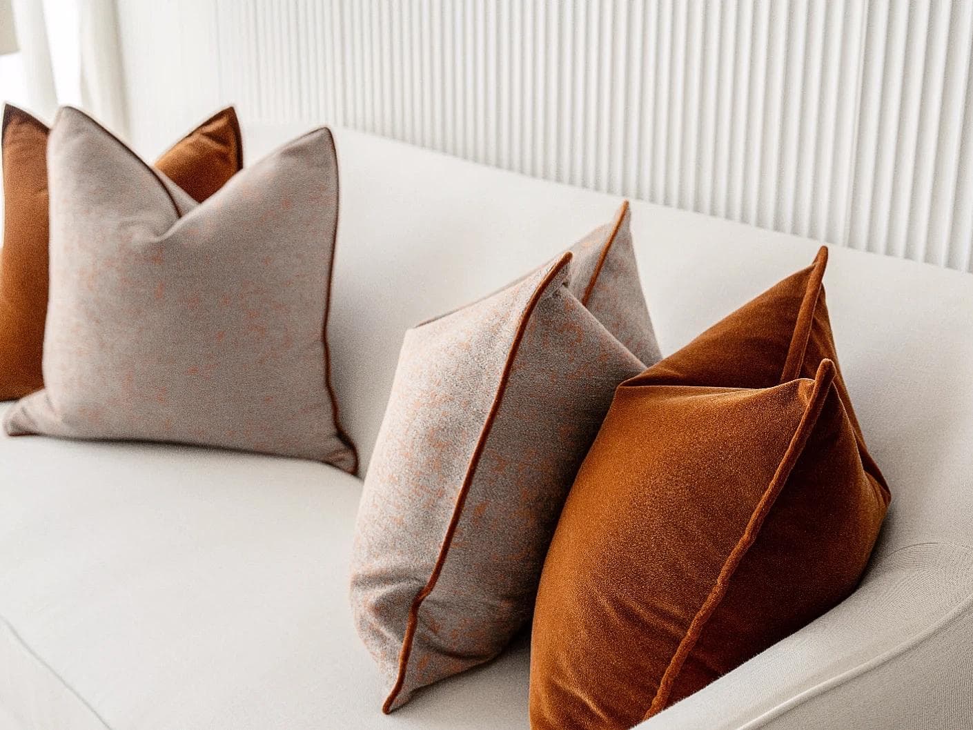 Evander Bundle cushion in rust, shown in a product right view as image 7