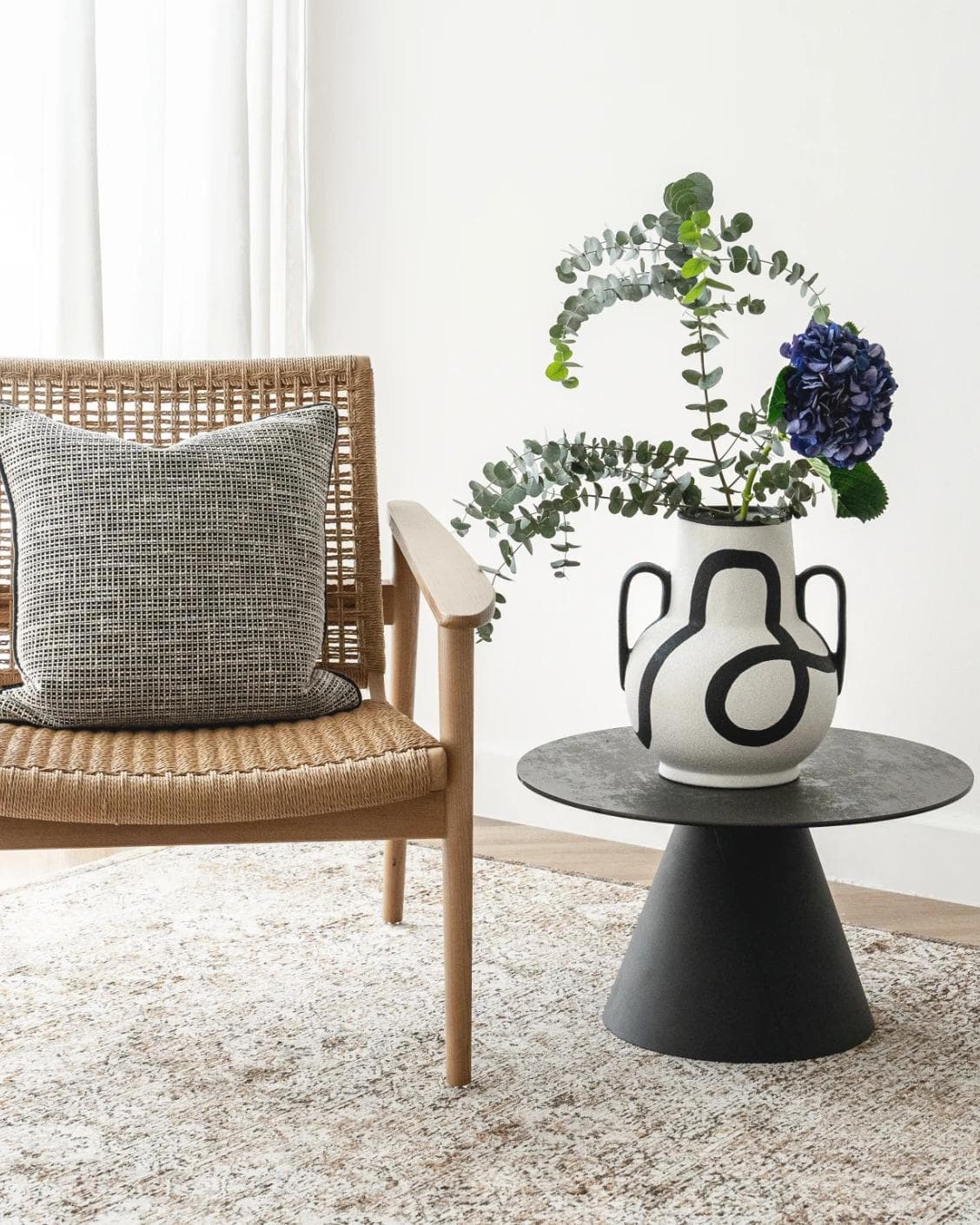 Evelina Arneson vases in black and white, shown in a lifestyle front view as image 2