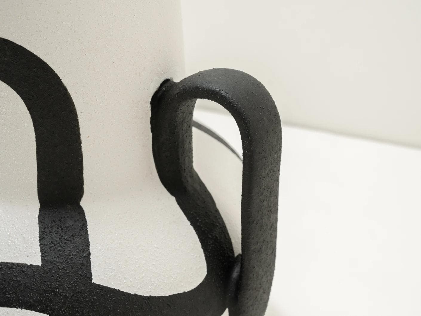 Evelina Arneson vases in black and white, shown in a product close-up top view as image 9