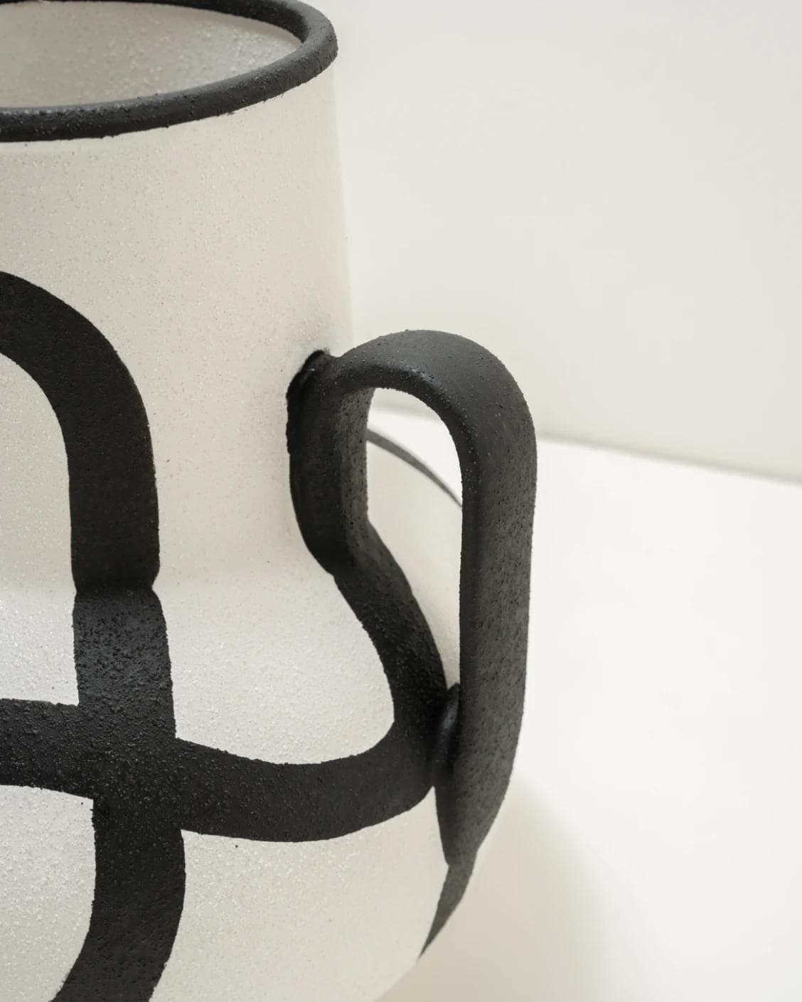 Evelina Arneson vases in black and white, shown in a product close-up top view as image 9