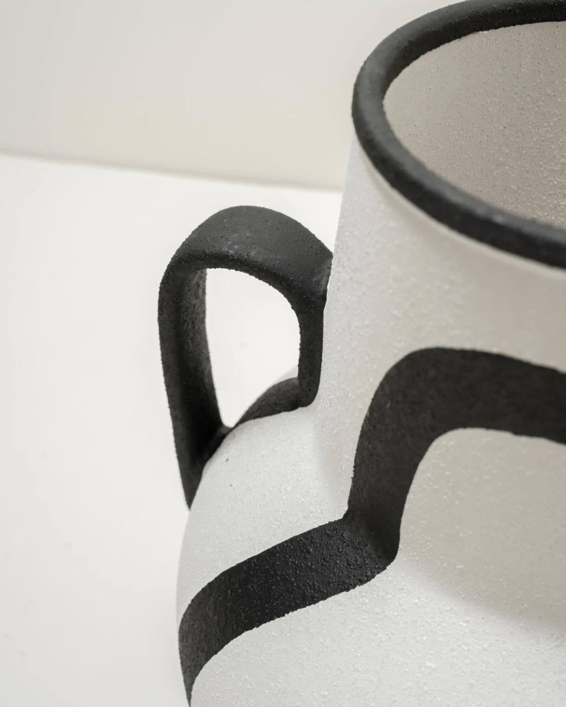 Evelina Arneson vases in black and white, shown in a product close-up top view as image 10