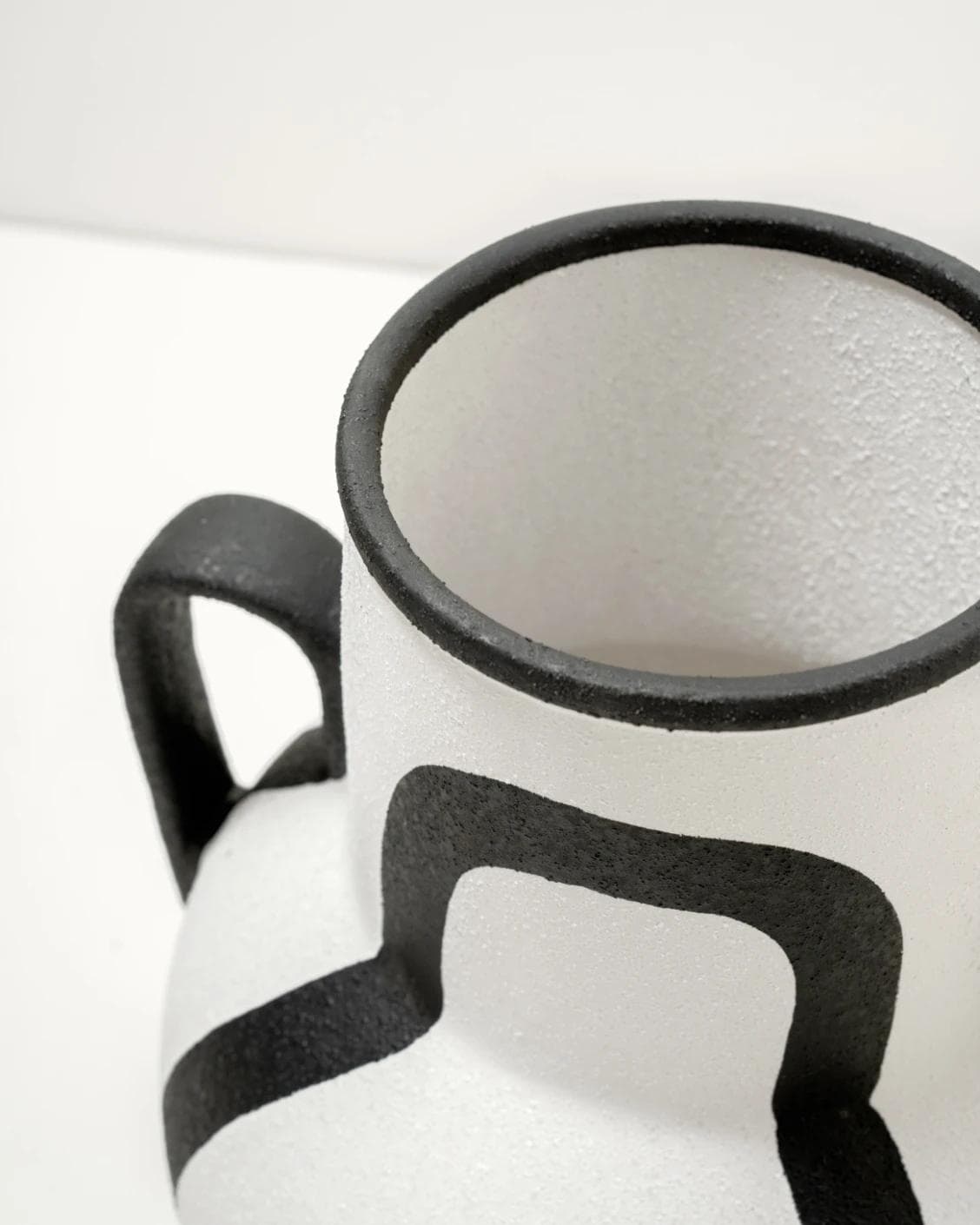 Evelina Arneson vases in black and white, shown in a product close-up top view as image 11