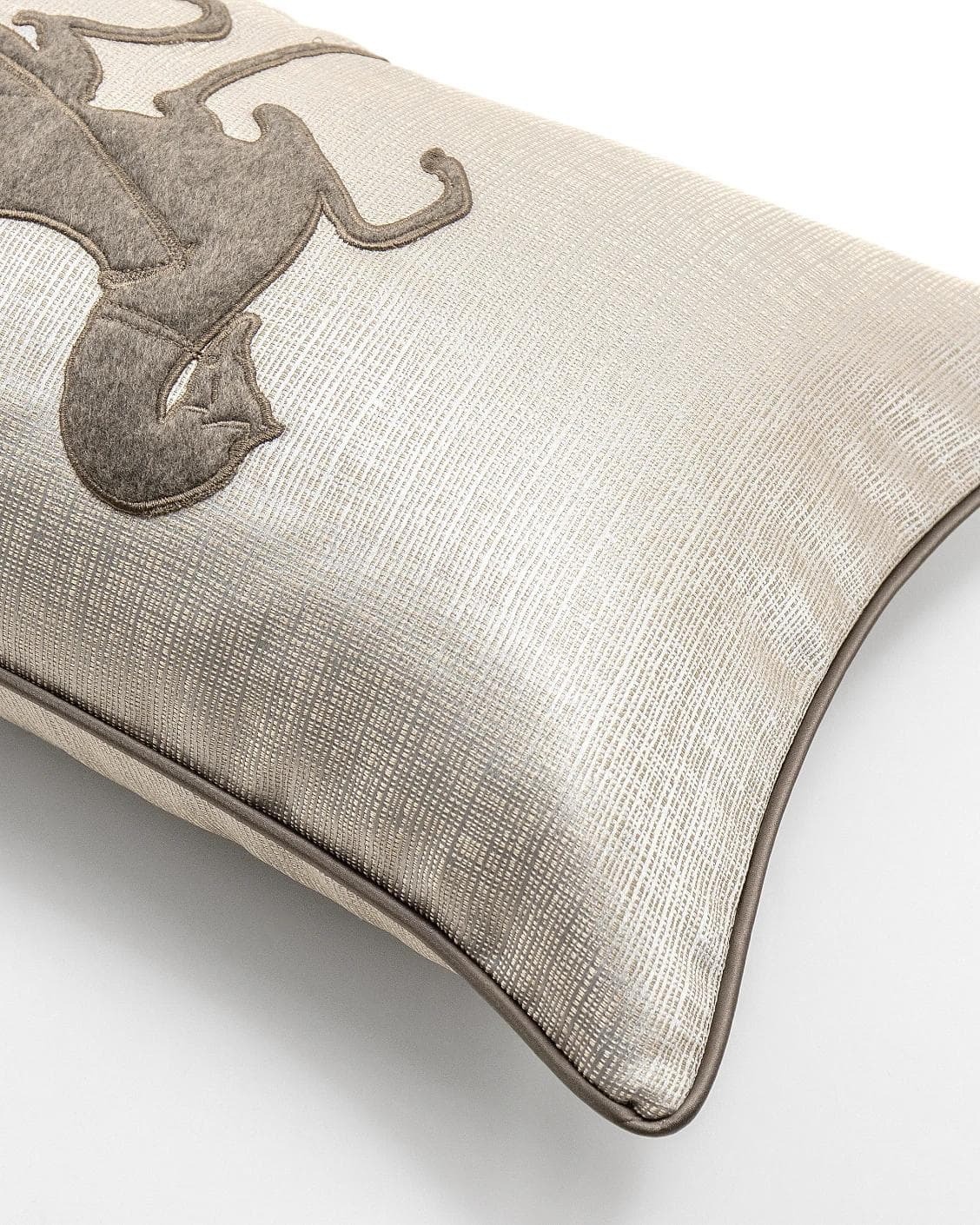 Faaris Laurent cushion in brown and beige, shown in a product top view as image 9