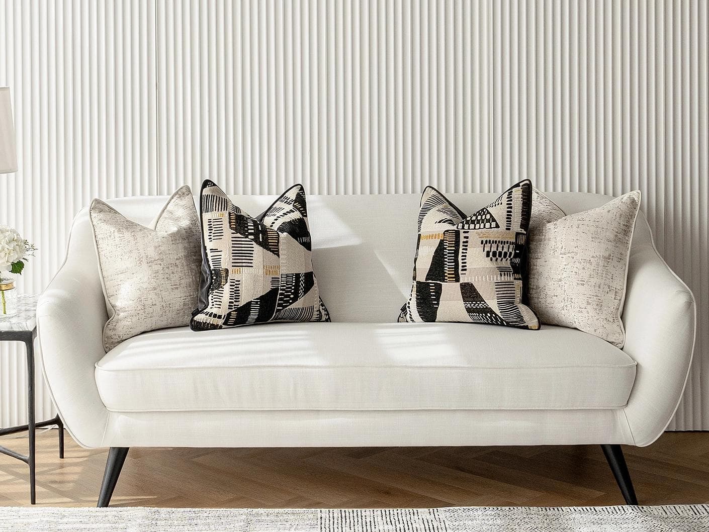 Fabron Bundle cushion, shown in a lifestyle front view as image 4