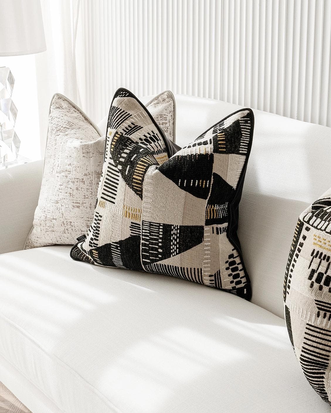 Fabron Bundle cushion, shown in a lifestyle right view as image 5