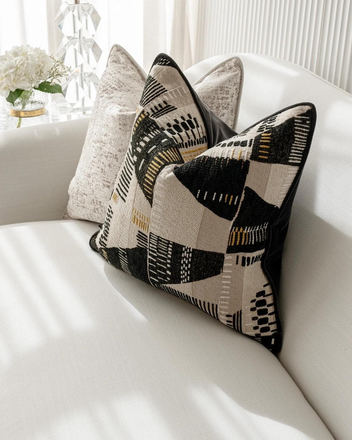 Fabron Bundle cushion, shown in a lifestyle top view as image 6