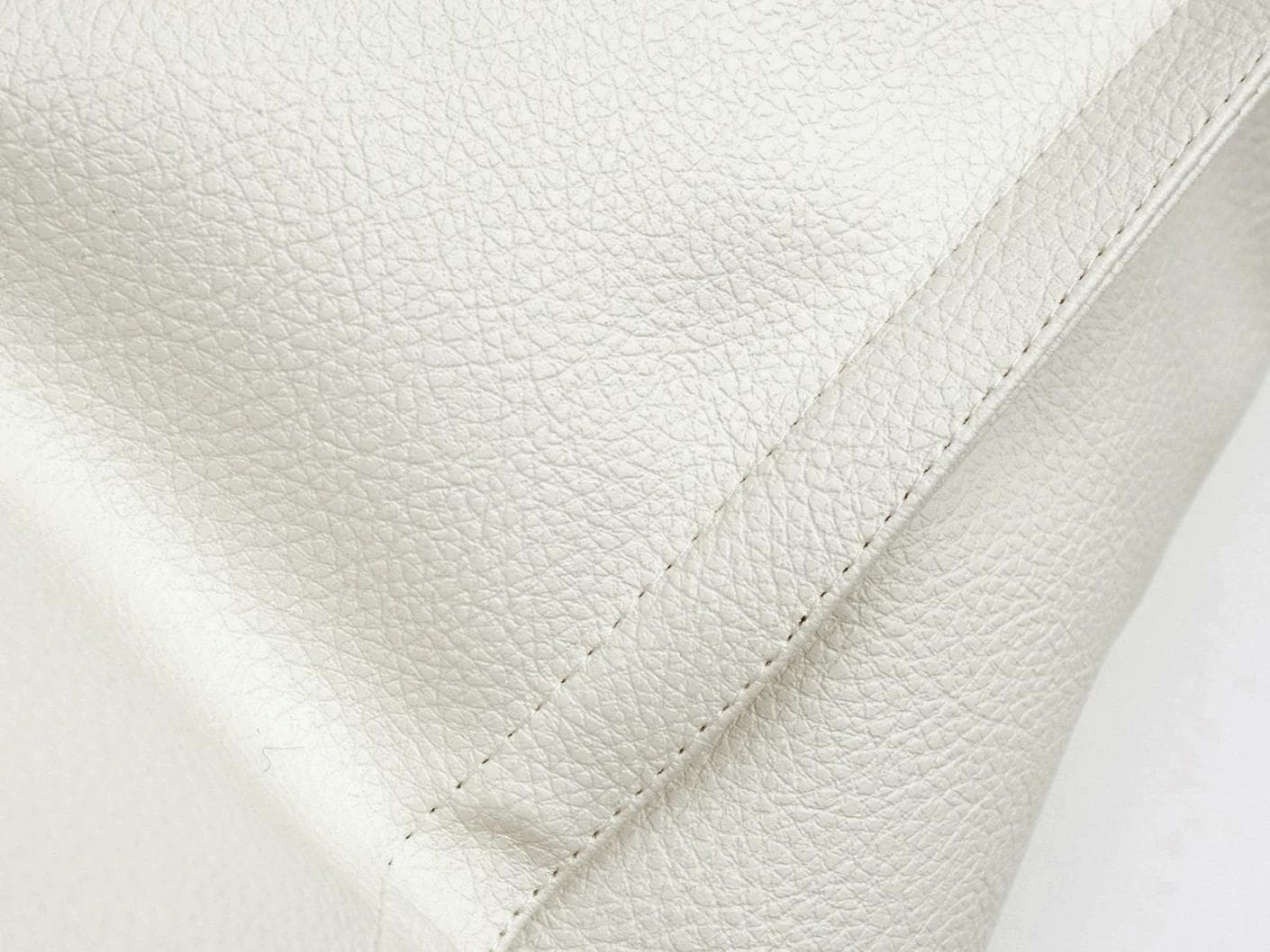 Filip Caravaggio cushion in white, shown in a product close-up as image 7