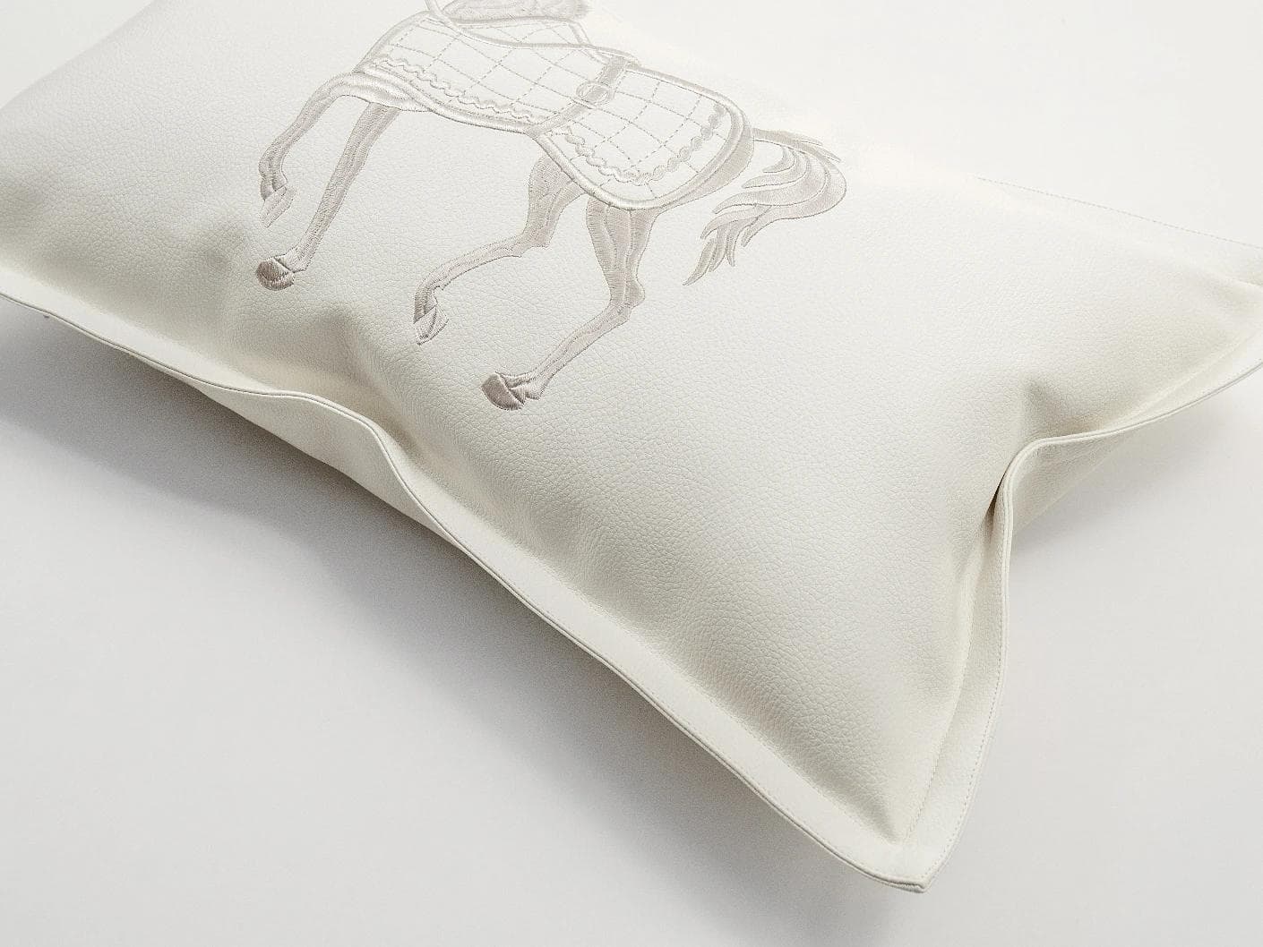 Filip Caravaggio cushion in white, shown in a product top view as image 2